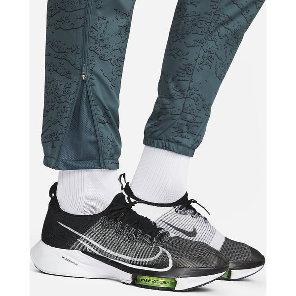 NIKE CHALLENGER WOVEN GRAPHIC PANTS 'TEAL'